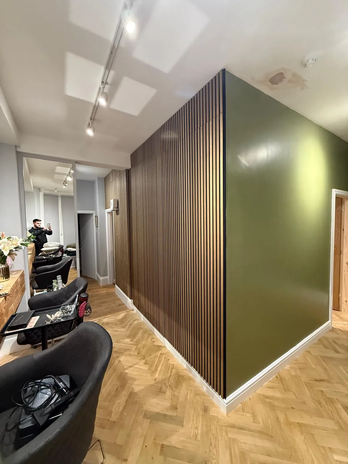 Contemporary vertical timber panelling in a hallway