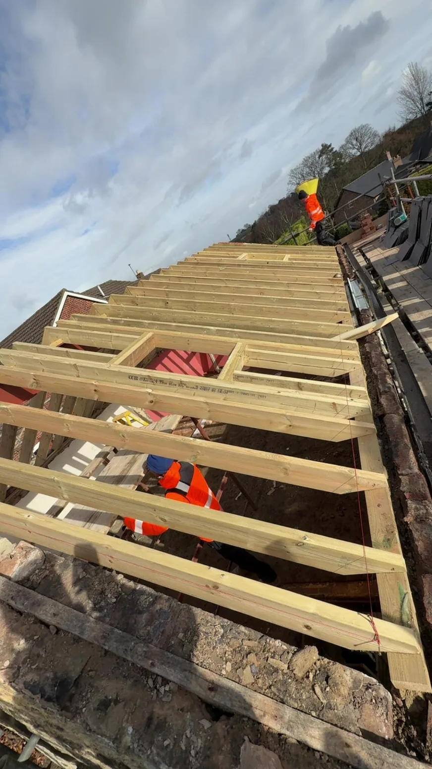 Timber roof framework being assembled on a building project